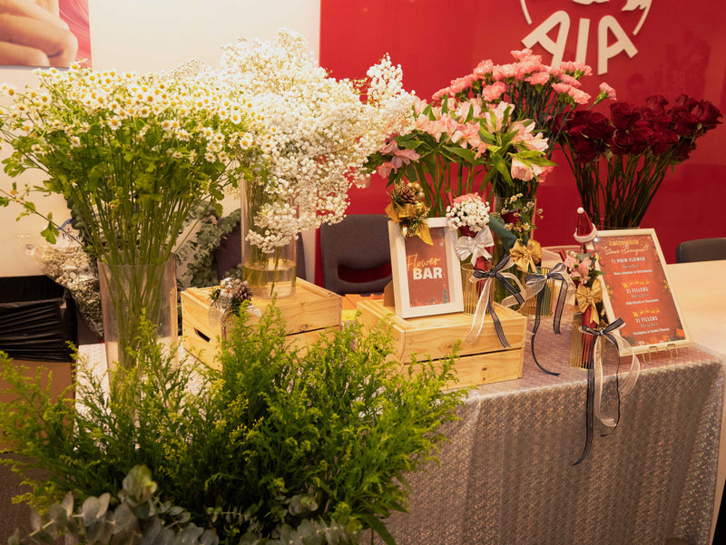 Floral arrangement station for AIA Christmas corporate event in Singapore