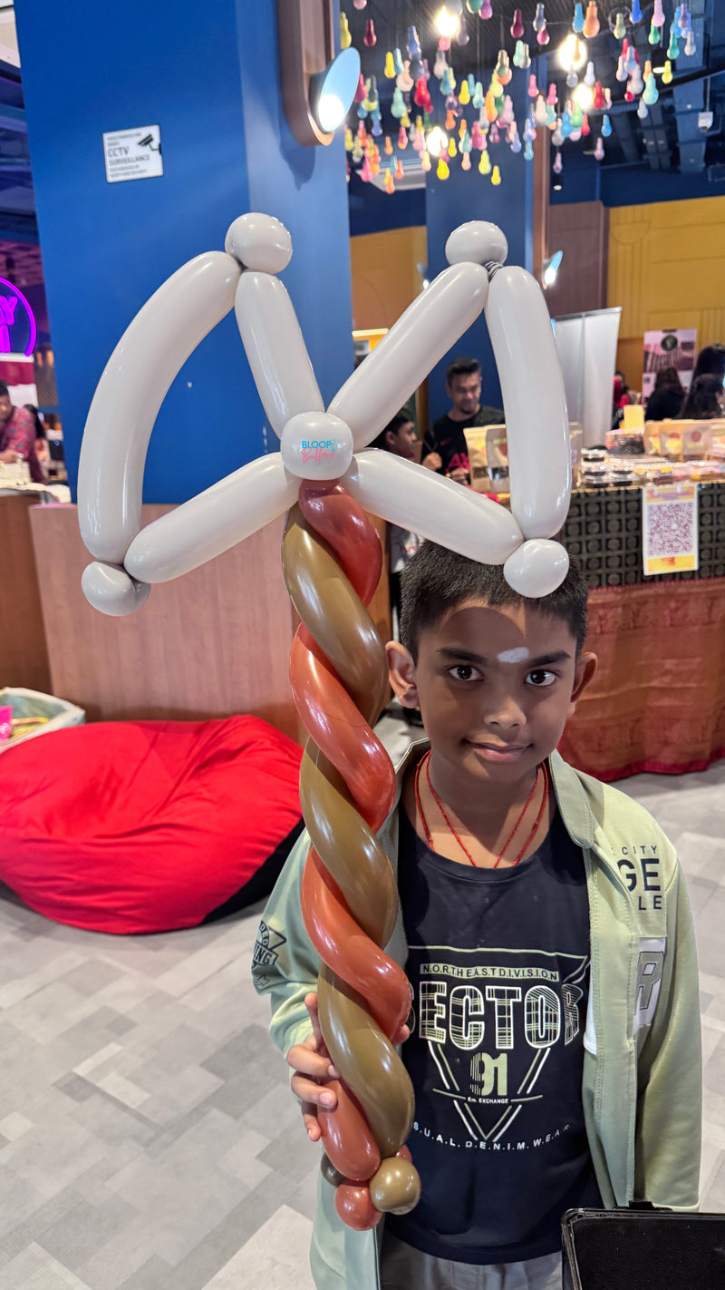 Axe balloon sculpting design for kids birthday party in Singapore by Bloop Balloons