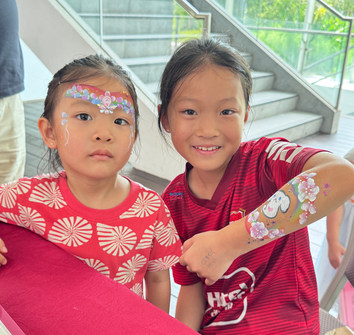 Cinnamoroll and flower face painting at SICC Singapore by Bloop Balloons