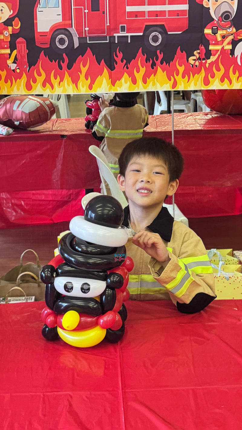 Fire engine balloon sculpting design for kids birthday party in Singapore by Bloop Balloons