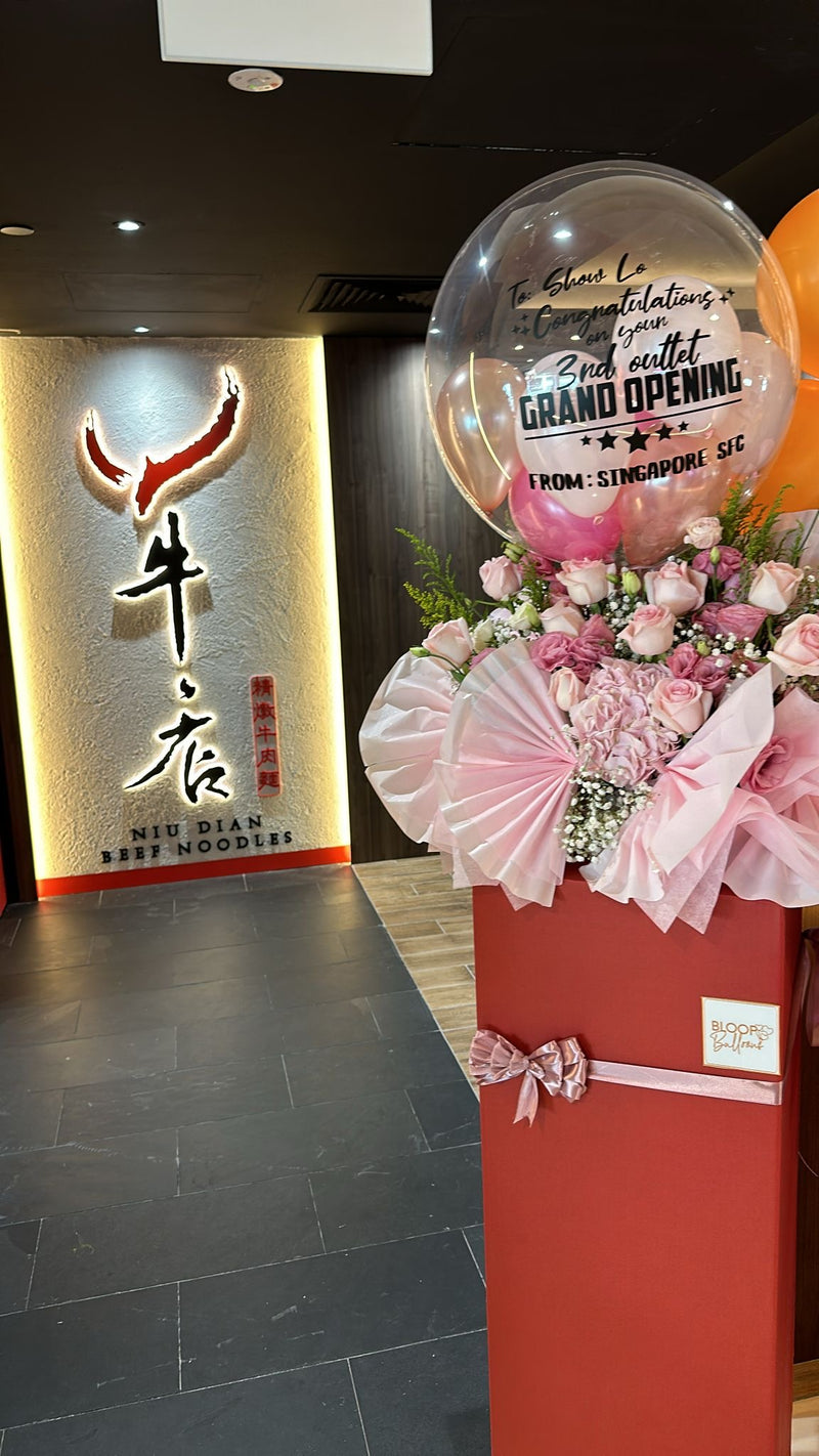 Grand opening flower stand for Niu Dian Beef Noodle with Show Lo Luo Zhi Xiang at the Singapore launch event