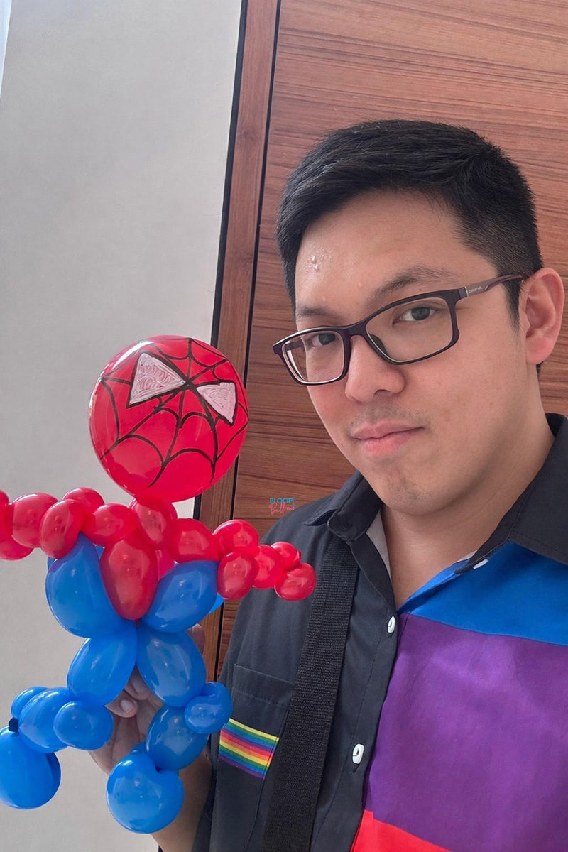 Spiderman balloon sculpting for kids birthday party at Chapel Road in Singapore by Bloop Balloons