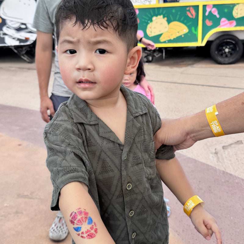 Spiderman glitter tattoo design for kids at ExxonMobil family day event in Singapore
