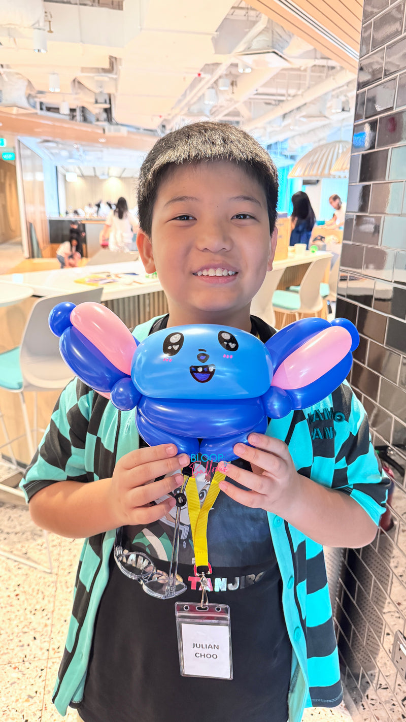 Stitch balloon sculpting for corporate event in Singapore by Bloop Balloons