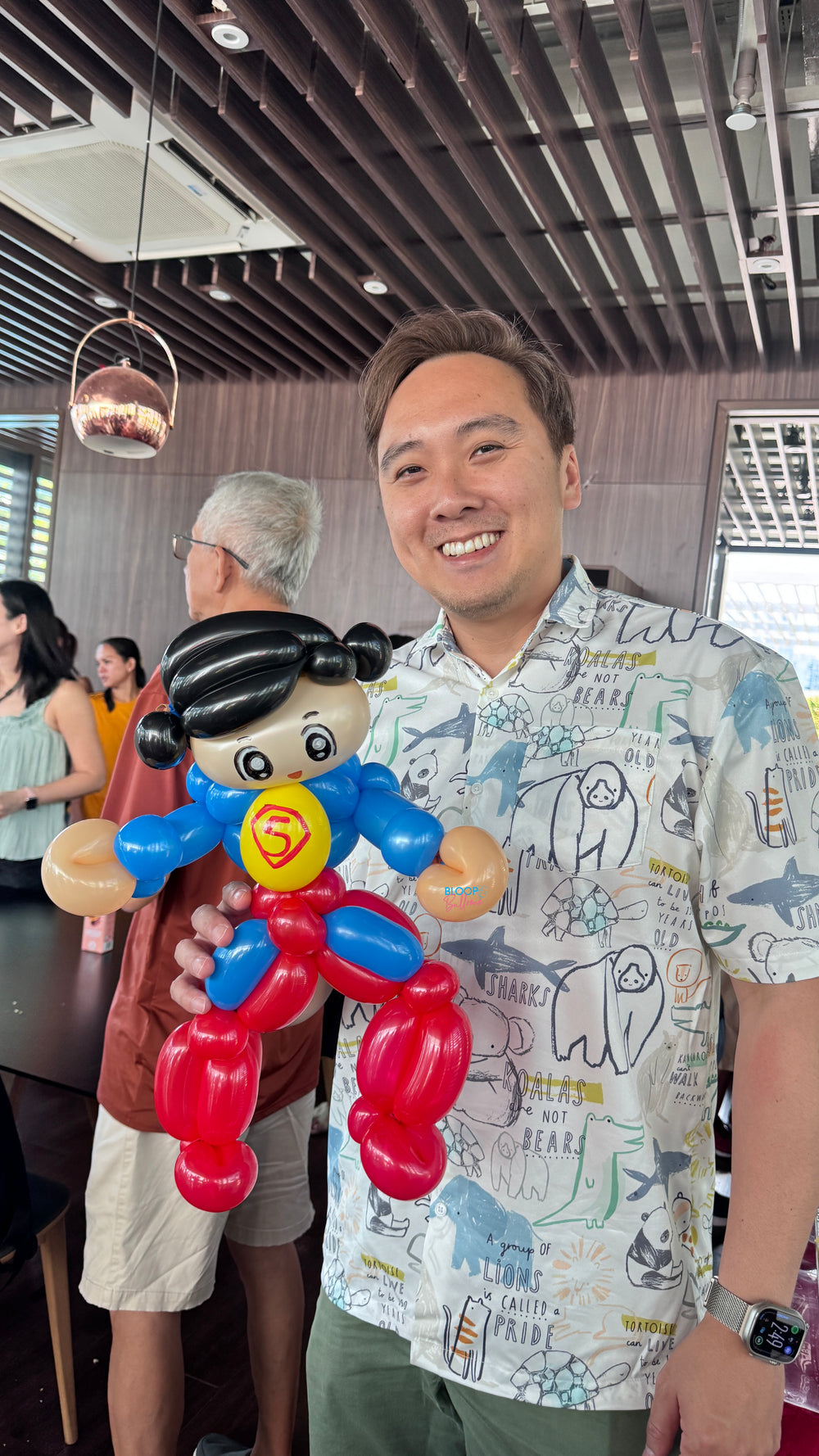 Superman balloon sculpting design for kids birthday party in Singapore by Bloop Balloons