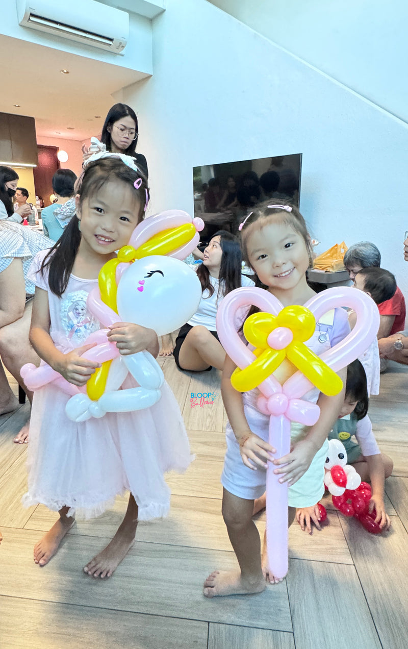 Unicorn and heart shape wand balloon sculpting design for kids birthday party in Singapore by Bloop Balloons