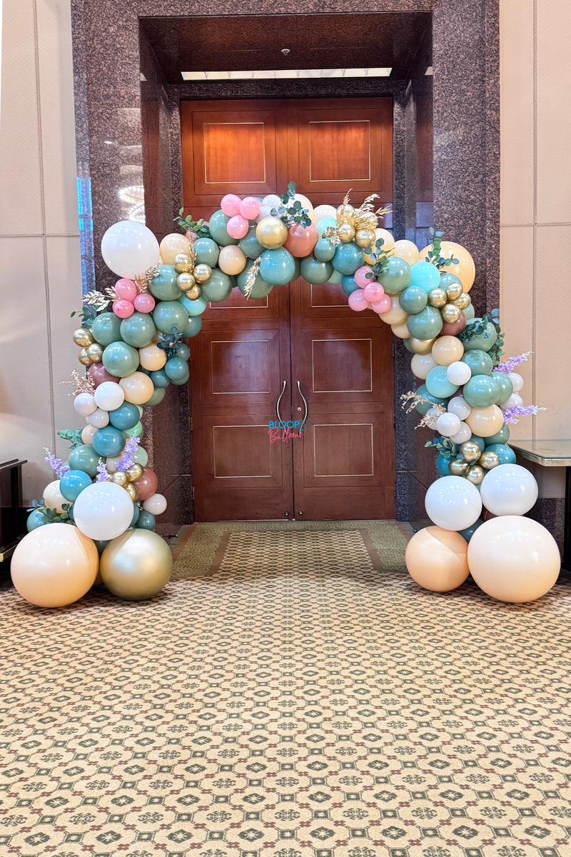 Whimsical balloon arch decoration created for Kajima corporate event in Singapore