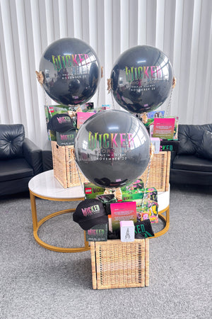 Wicked For Life themed hot air balloon basket gift created as a PR kit by Bloop Balloons in Singapore